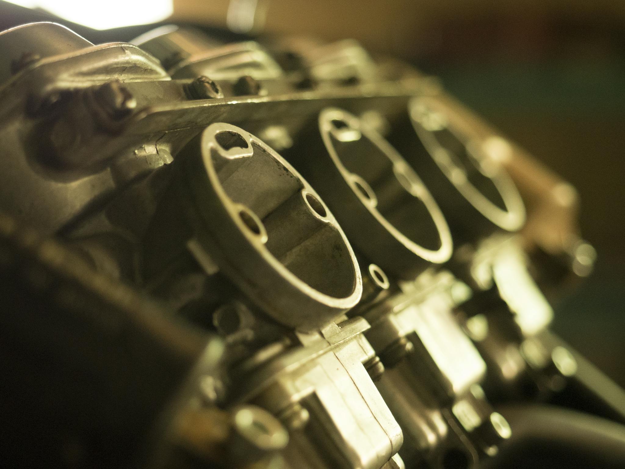 Detailed view of a metal engine component showcasing precise engineering.